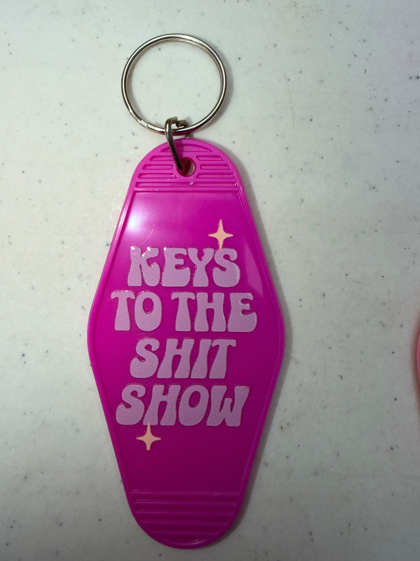 Hotel Book Keychains