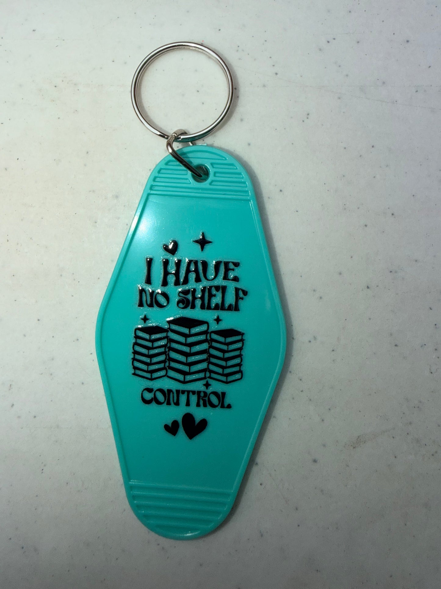 Hotel Book Keychains