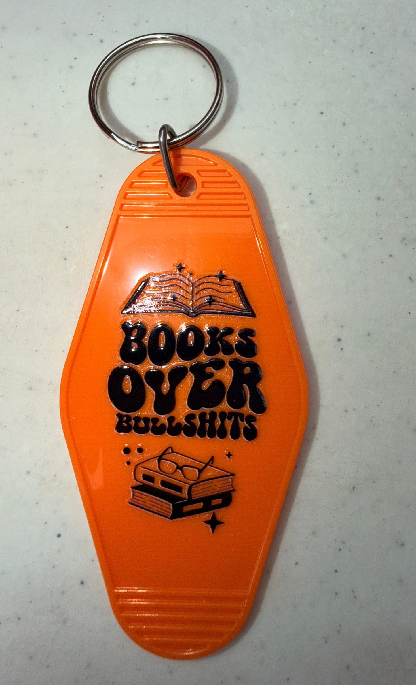 Hotel Book Keychains