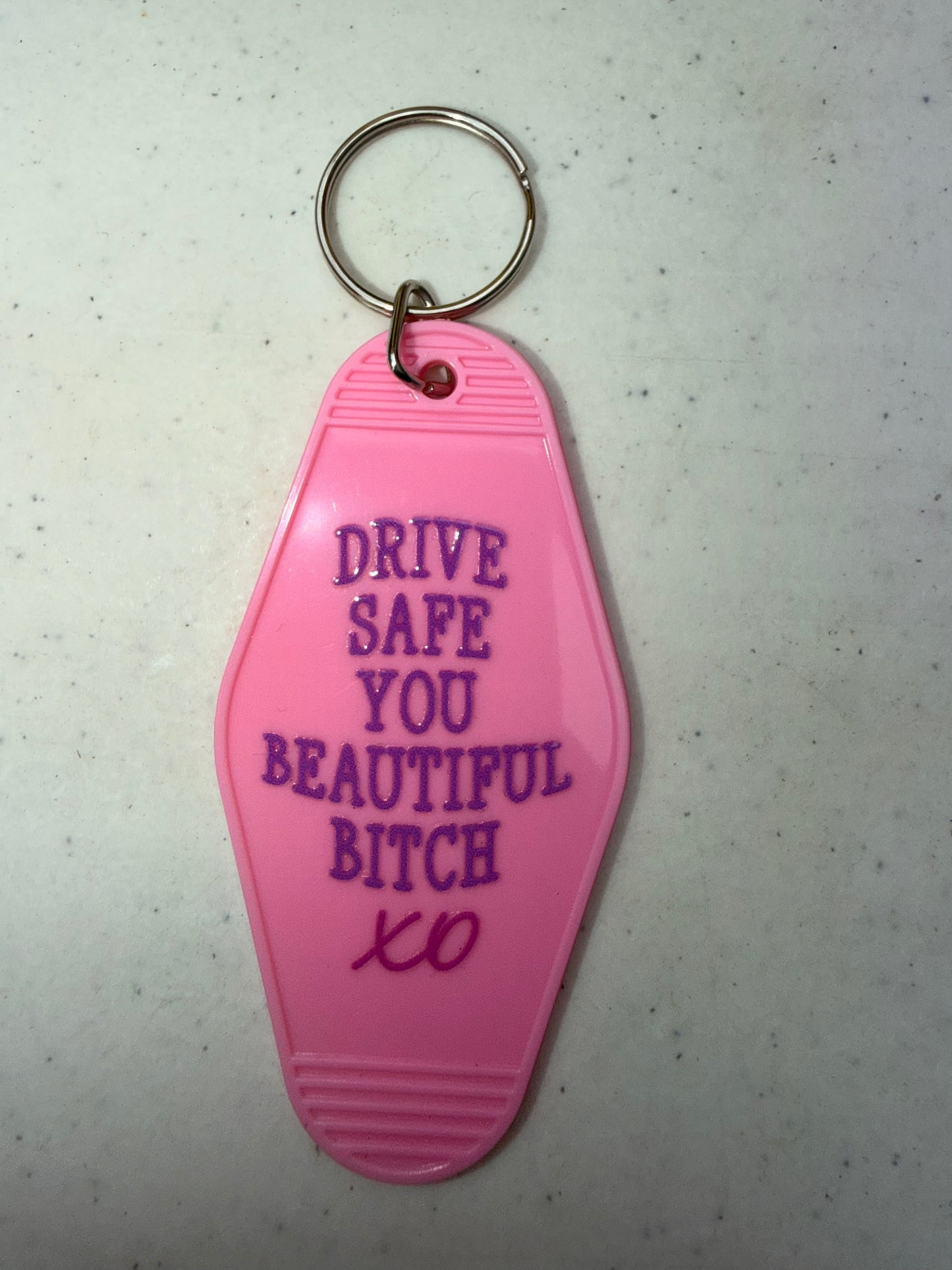 Hotel Book Keychains